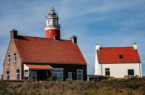 Vuurtoren Texel de Cocksdorp tijdens fietsvakantie in nederland op een cruiseboot met groep